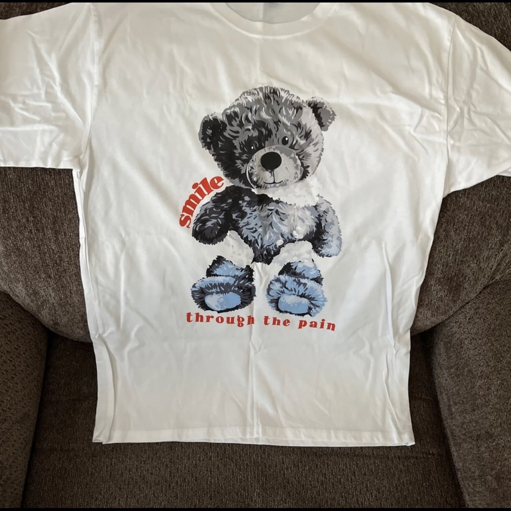 Smile through the pain tee